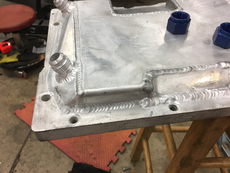 Building the low-profile oil pan.